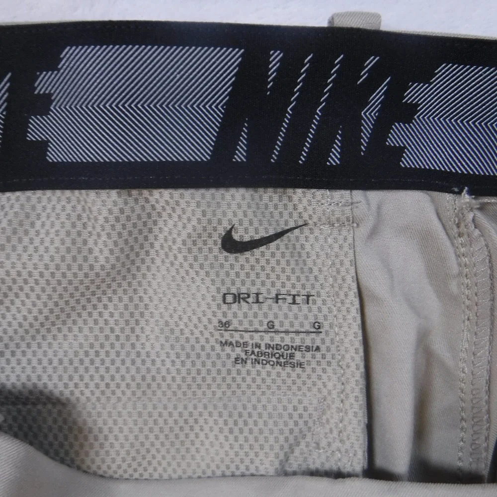 Nike Dri-FIT Mens‎ Golf Pants Khaki Tan Flat Front Stretch Trousers Size 36 x 35